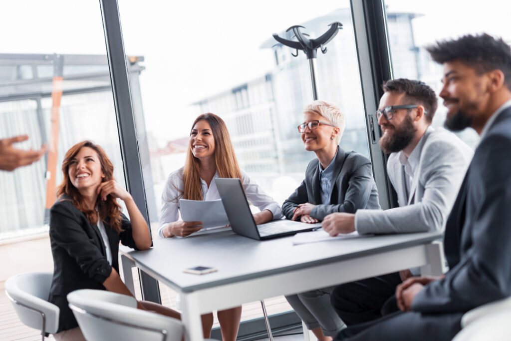 happy business people in a meeting